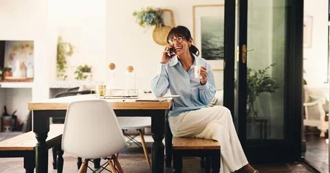 Remote work, phone call and woman with laugh for conversation, networking a.. Stock Photos