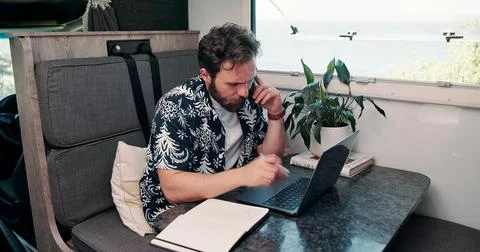 Remote work, phone call and man on laptop in camper van for tourist guide Stock Photos
