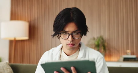 Remote work, reading or confused man with tablet for editing, feedback or Stock Footage 327367675