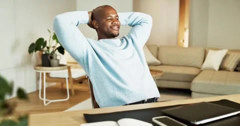 Remote work, relax and black man in home office, stretching and thinking wi.. Stockfoto's