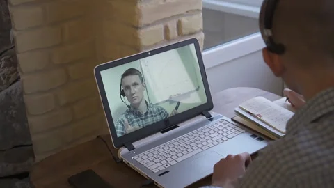 Remote work. Remote teaching. The teacher works remotely. Stock Footage 148447216