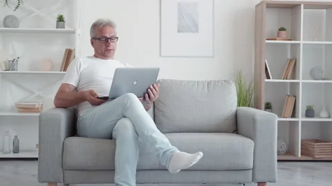 Remote work stress broken computer annoyed man Stock Footage 197380693