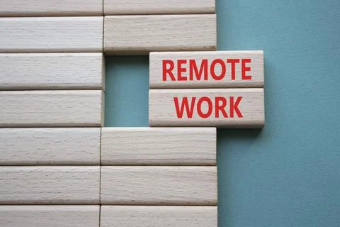 REMOTE WORK symbol. Concept word REMOTE WORK on wooden blocks. Beautiful gr.. 写真素材