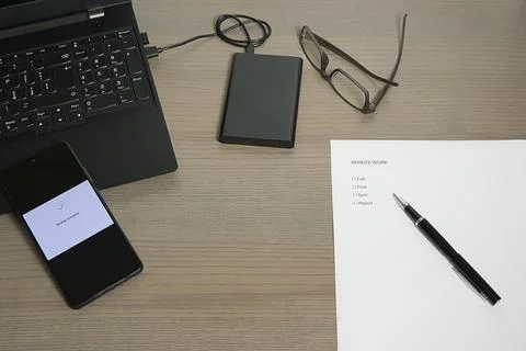 Remote Work Tasks and Digital Backup Scene Stock Photos