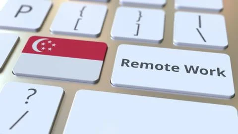 Remote Work text and flag of Singapore on the computer keyboard. Telecommuting Illustrazione stock