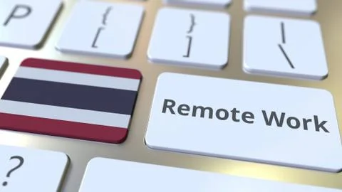 Remote Work text and flag of Thailand on the computer keyboard. Telecommuting or Illustrazione stock