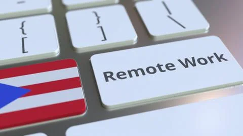 Remote Work text and flag of Puerto Rico on the computer keyboard. Telecommuting Illustrazione stock