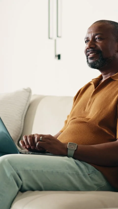 Remote work, thinking and man in home on laptop for internet, networking and Stock Footage 338051381