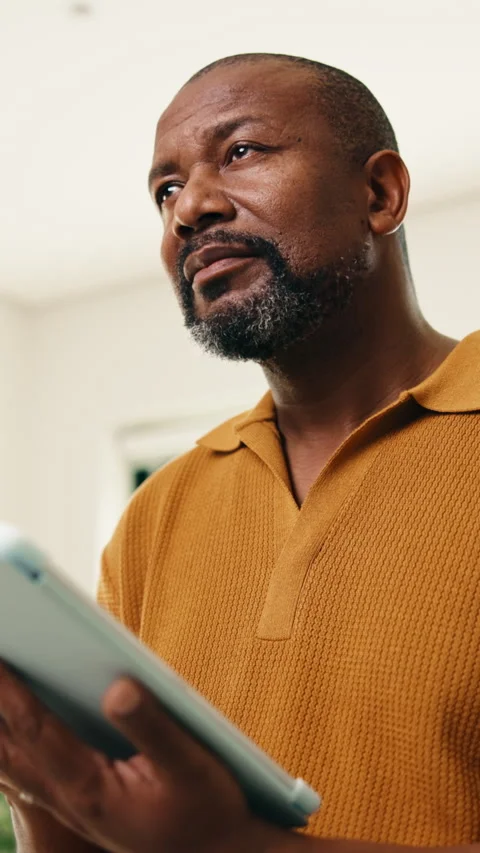 Remote work, thinking and man in home on tablet for internet, networking and Stock Footage 338114693