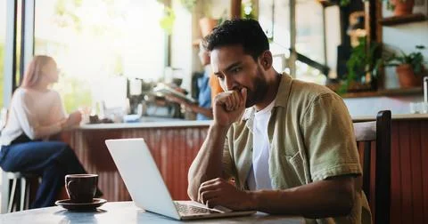 Remote work, thinking and man in cafe with laptop for social media, campaign and Stock Photos