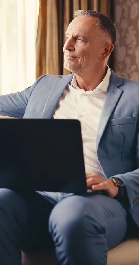 Remote work, thinking or man in hotel with laptop, funding proposal or Video stock 345651002