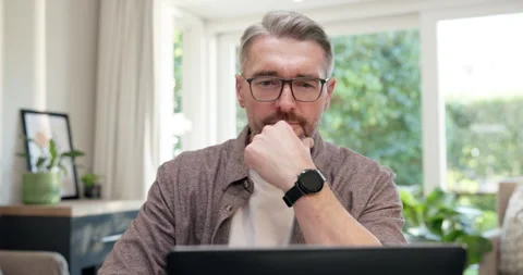 Remote work, thinking or man in home office with laptop, funding pitch or Stock Footage 345705494