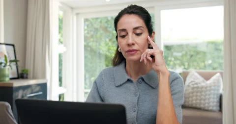 Remote work, thinking or woman in home office with laptop, funding proposal or Video stock 345707369