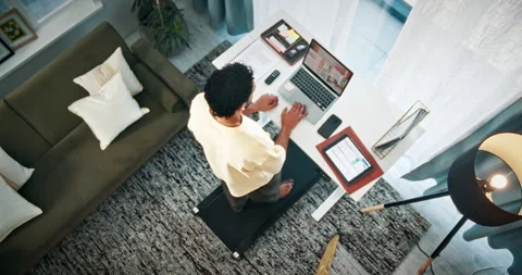 Remote work, treadmill and above of man on laptop for copywriting, editing and Stock Footage 330235628