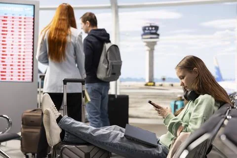 Remote worker react to postponed flights and shutdown conditions Stock Photos