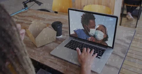 Remote worker tapping laptop with coffee cup, joining secure call with animated Stock Footage 331336104