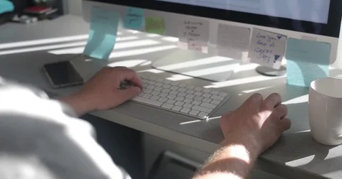 Remote worker uses keyboard in home office Stock Footage 78037089