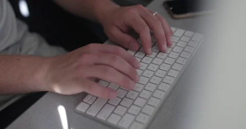 Remote worker uses keyboard in home office Stock Footage 78037113
