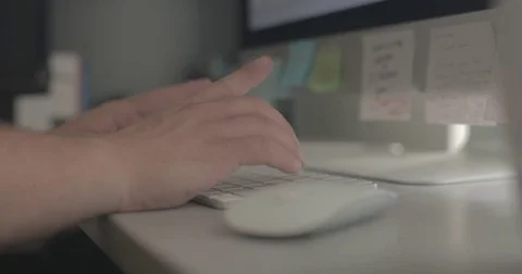 Remote worker uses keyboard in home office Stock Footage 78037229