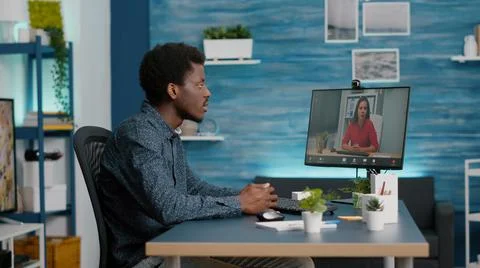 Remote worker working from home, talking on online conference internet video Foto stock