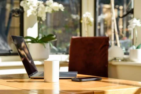 Remote working area with laptop setup to work from home Stock Photos