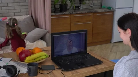 Remote working with child in home office during Covid-19 lockdown. Video chat Stock-Footage 148463162