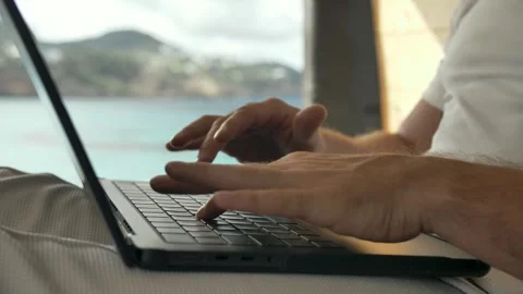 Remote working lifestyle enjoying work in a van by the beach Vidéo 291903458