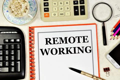 Remote working. Text label in the working folder. Stock Photos