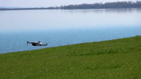 Remotely controlled drone with camera system in full operation Stock Footage 270535588