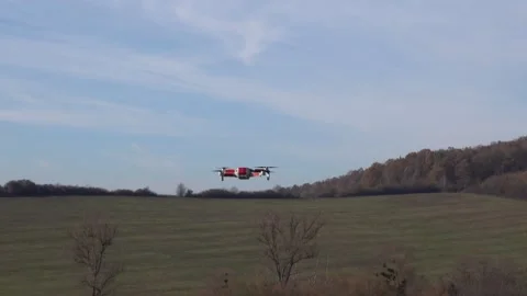 Remotely controlled drone with camera system in full operation Stock Footage 291976439