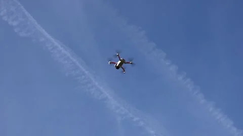 Remotely controlled drone with camera system in full operation Stock Footage 291977651