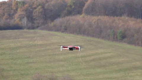 Remotely controlled drone with camera system in full operation Stock Footage 291982226