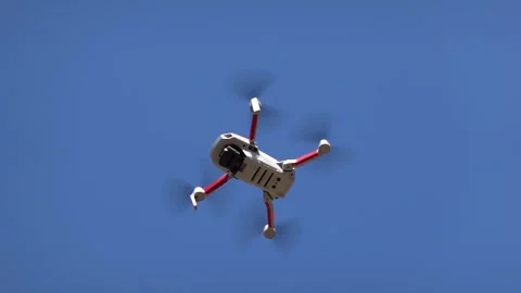 Remotely controlled drone with camera system in full operation Stock Footage 304739160