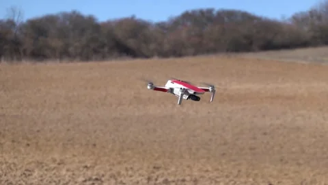 Remotely controlled drone with camera system in full operation Stock Footage 304739161