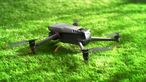 Remotely Controlled Uncrewed Quadcopter Takes Off From Green Grass Stock Footage 278831200