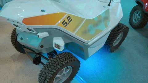 A remotely controlled vehicle with all-terrain wheels and suspension Stock Footage 330896115