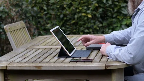 Remotely working from garden office Stock Footage 88917814