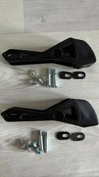 Removable Inline Skate Brake Kit with Screws and Bolts on Wooden Floor Stock Photos