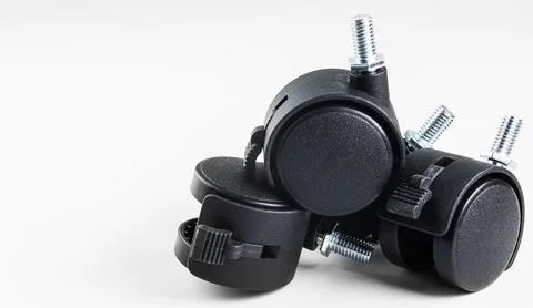 Removable wheels from a chair or table Stock Photos