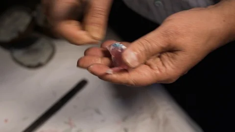 Removal of cast plaster parris from the denture (artificial jaw) bast heat Video stock 108007613