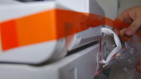 Removal of protective tapes from the printer Stock Footage 81139069