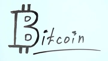 Removal of a symbol of bitcoin Stock Footage 85922838