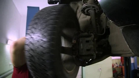 Removal of vehicle wheel Stock Footage 70355271