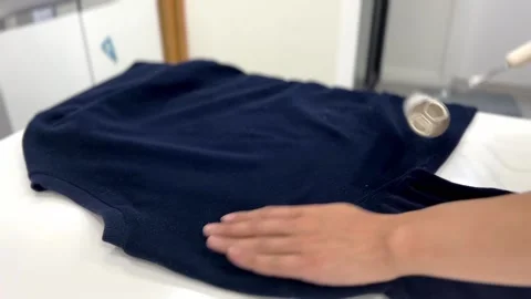 Remove dust from clothes Stock Footage 172921574