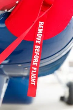 Remove before flight on the aircraft fuselage Stock Photos