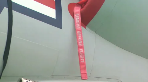 --Remove Before Flight-- Ribbon on fighter aircraft Stock Footage 39824583