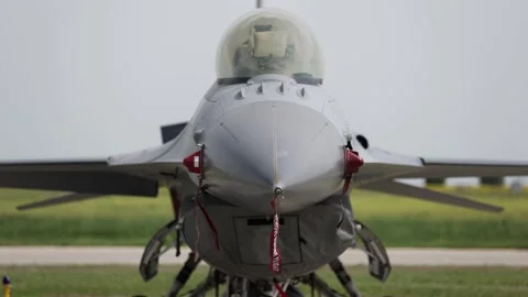 Remove before flight ribbon safety on a fighter jet Stock Footage 274144643