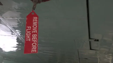 Remove before flight tag Stock Footage 238998065