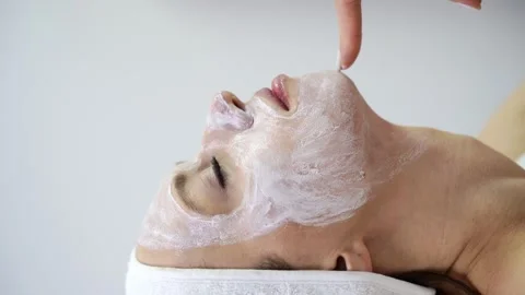 Remove mascara. Face massage at luxury spa salon. Doctor hand. Female patient Stock Footage 279407614