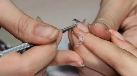 Remove old paint on nails Stock Footage 64570243